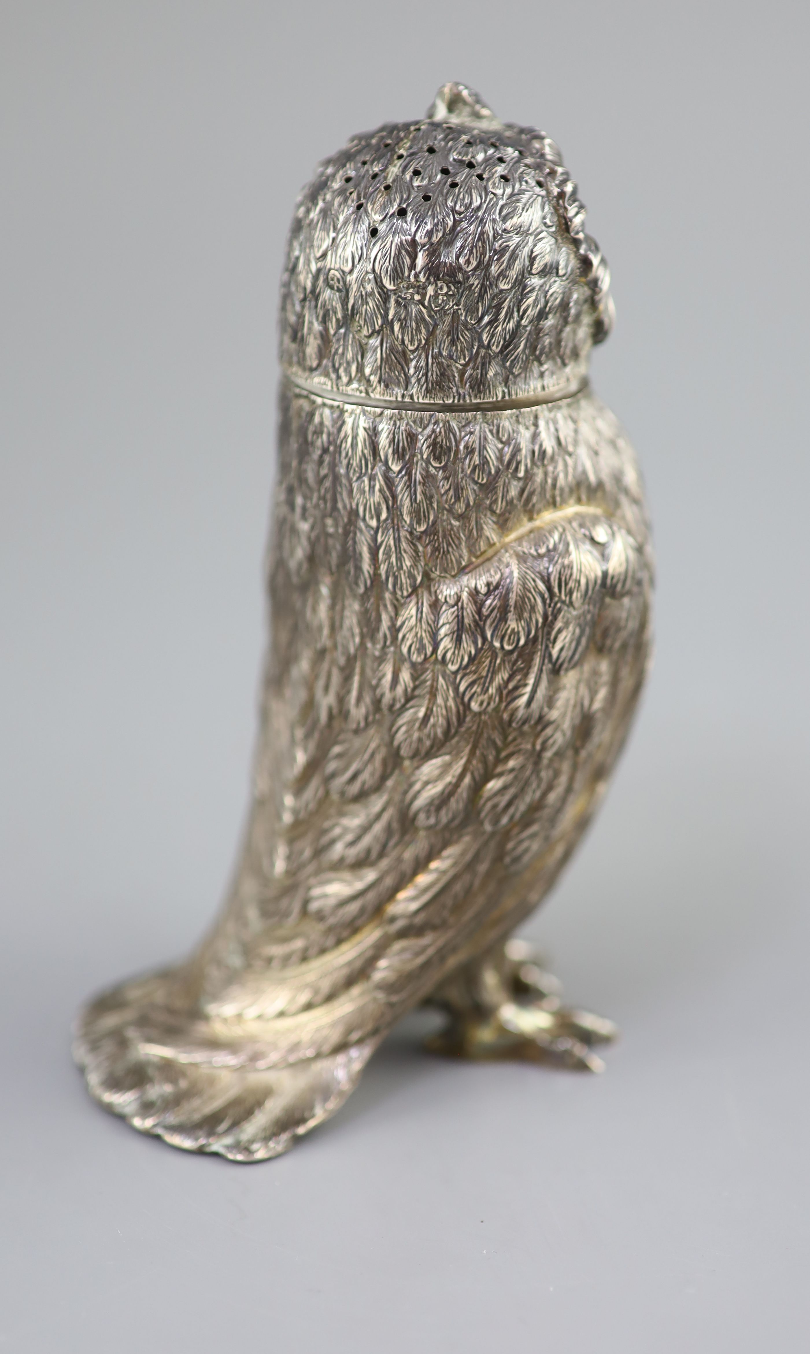 A Victorian silver owl sugar sifter, having chased feather decoration and removable head inset glass eyes,